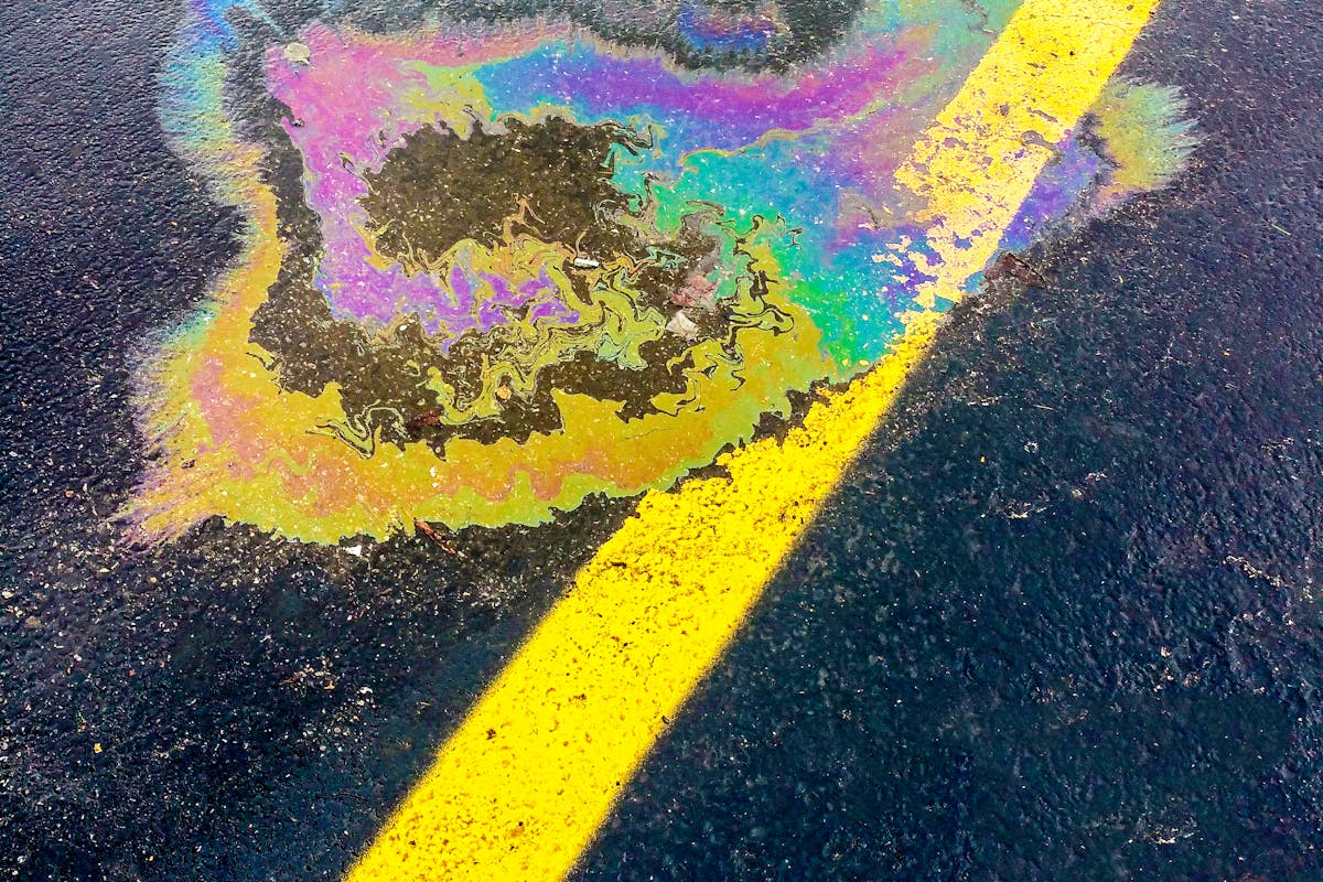 car fluid leak on the road